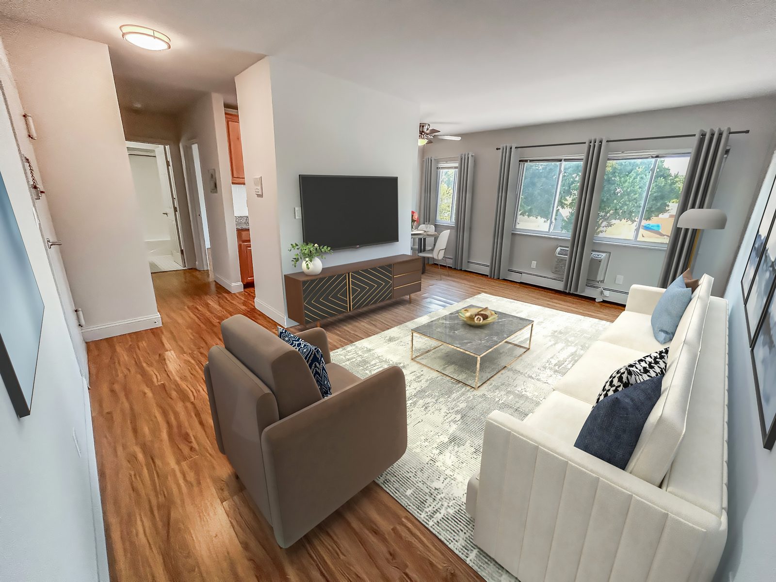 One-bedroom living room at Cypress Apartments